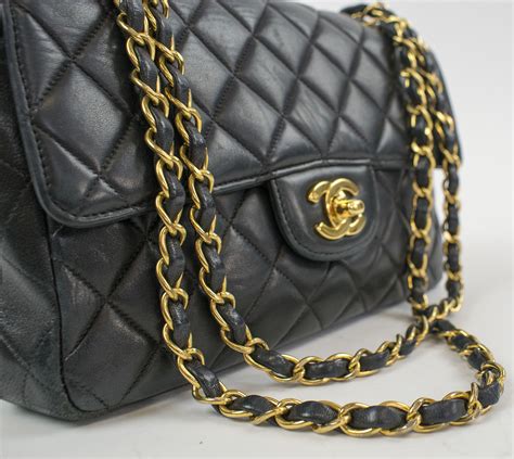 chanel bag black gold chain